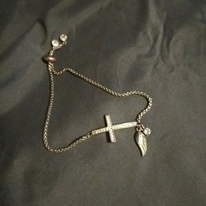 Adjustable silver cross bracelet
